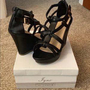 Black wedges. Worn once. Size 8